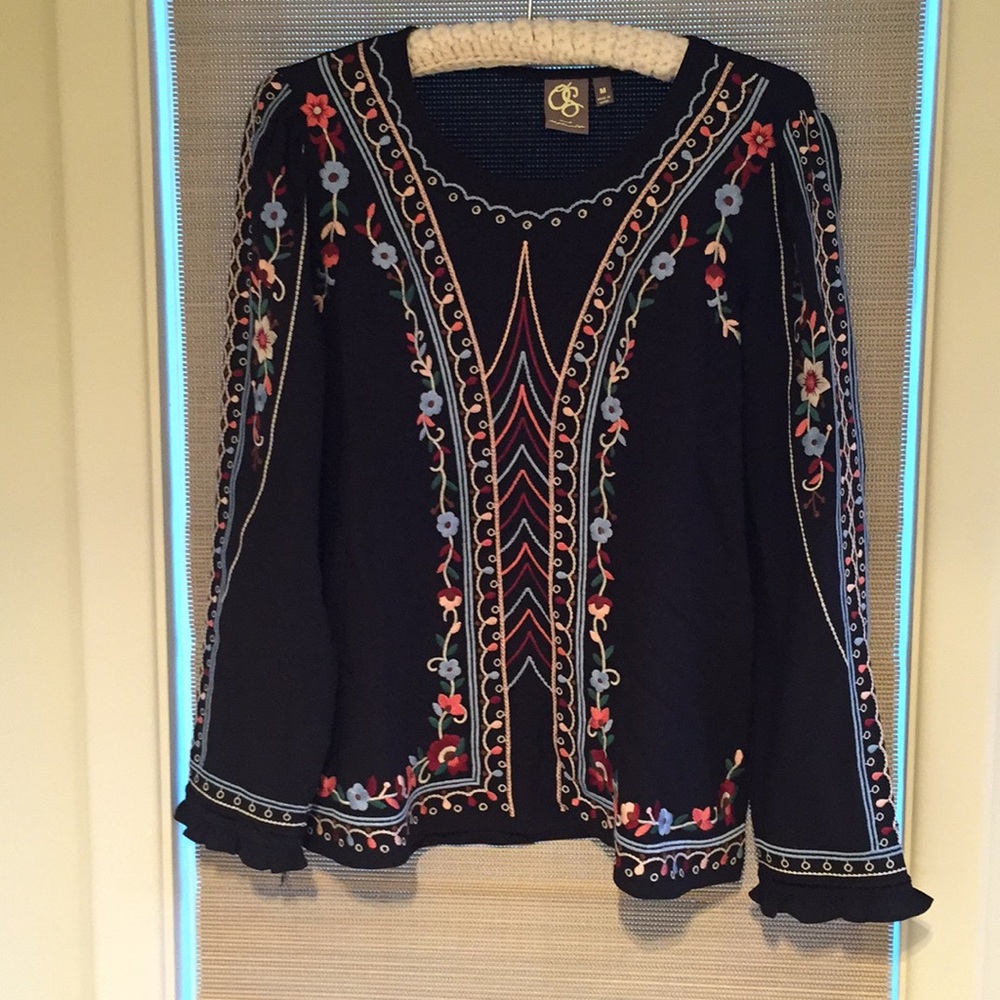 Super cute with embroidered details! Worn once.